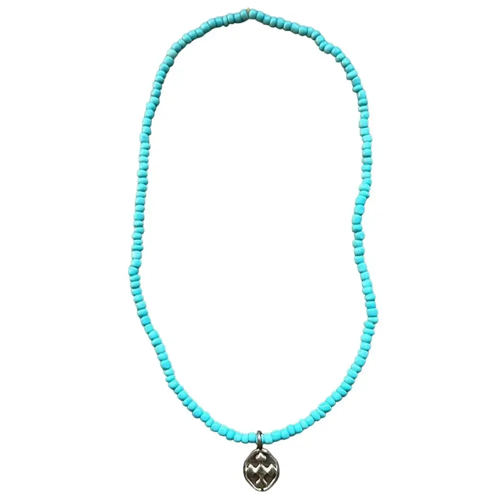 Unbranded teal beaded